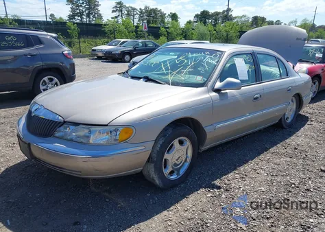 2001 Lincoln Continental from USA, damaged, VIN 1LNHM97V31Y638576